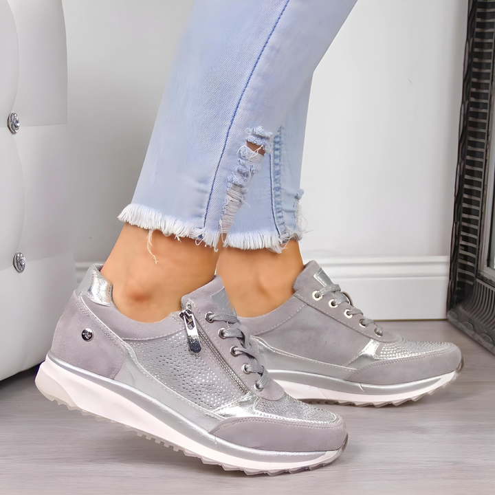 "Women's orthopedic athletic sneakers with non-slip soles, breathable mesh, cushioned insoles, lace-up design, blue and gray"