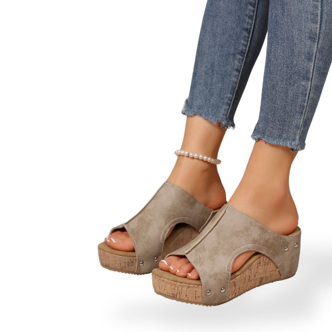 "Women's orthopedic cork wedge sandals in black with open-toe, breathable material, and supportive footbed."