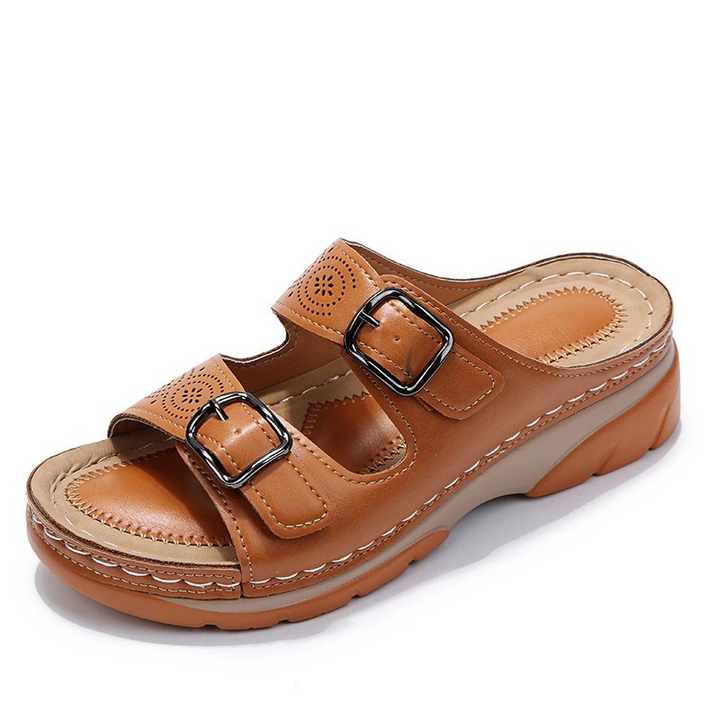Women's orthopedic sandals with cushioned insole, open-toe design, brown color, adjustable straps for ergonomic support.
