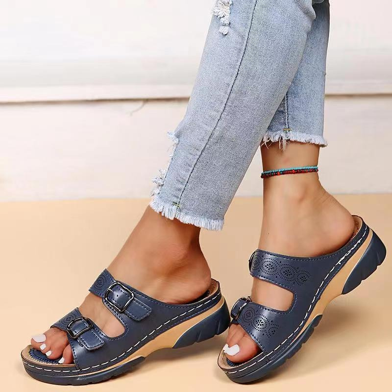 Women's orthopedic sandals with cushioned insole, open-toe design, brown color, adjustable straps for ergonomic support.