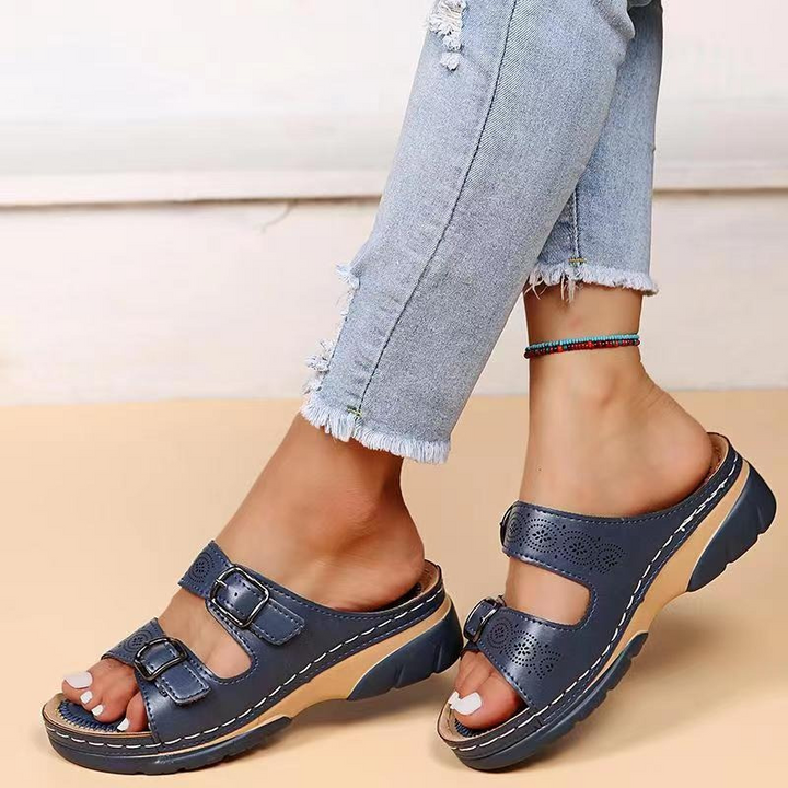 Women's orthopedic sandals with cushioned insole, open-toe design, brown color, adjustable straps for ergonomic support.