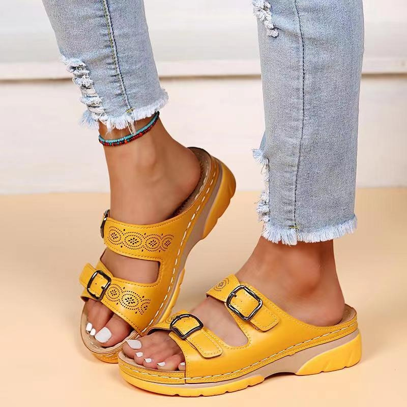 Women's orthopedic sandals with cushioned insole, open-toe design, brown color, adjustable straps for ergonomic support.