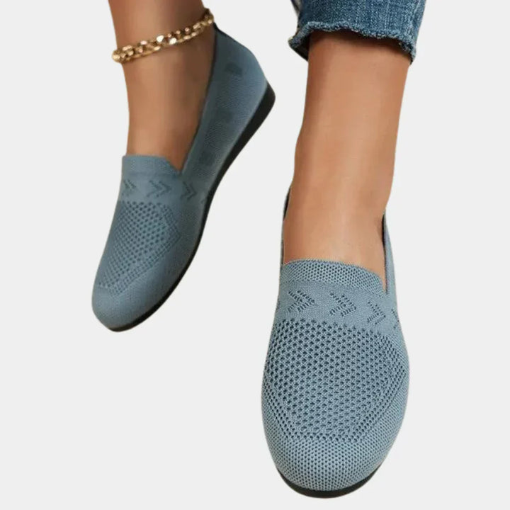 Women's orthopedic shoes in blue, ergonomic design, anti-slip sole, breathable material, stylish support for comfort.