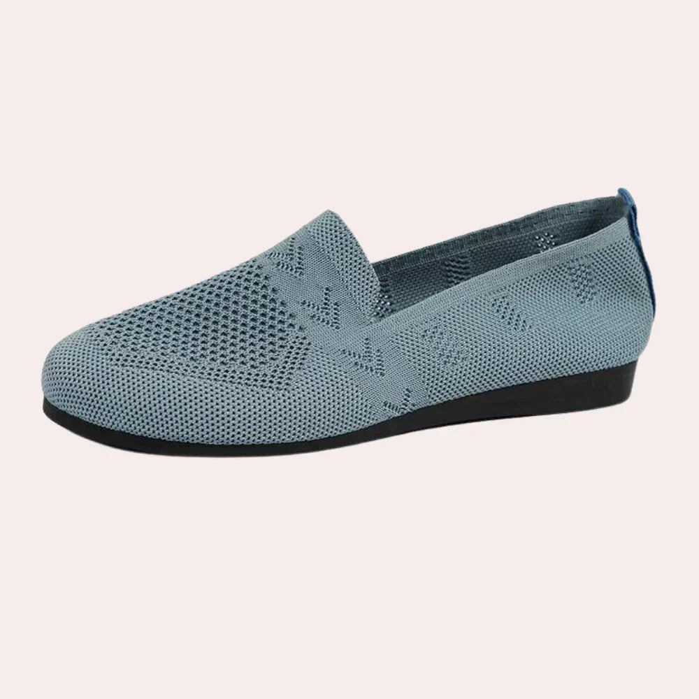 Women's orthopedic shoes in blue, ergonomic design, anti-slip sole, breathable material, stylish support for comfort.
