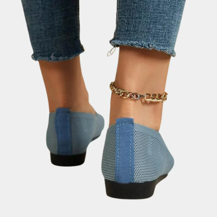Women's orthopedic shoes in blue, ergonomic design, anti-slip sole, breathable material, stylish support for comfort.