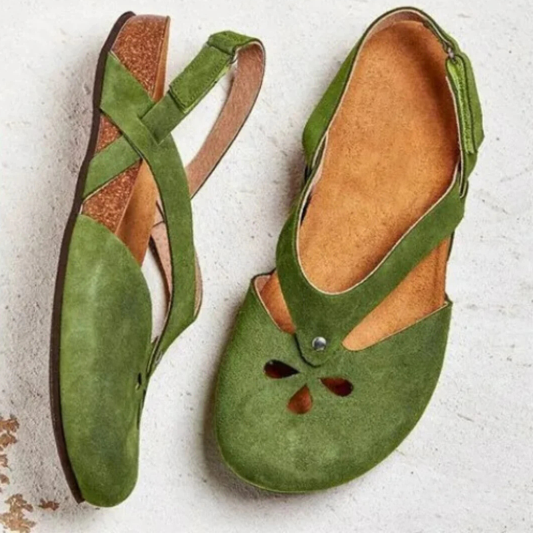 Women's orthopedic slingback sandals with ergonomic insole, cross-strap, and closed toe for style and comfort.