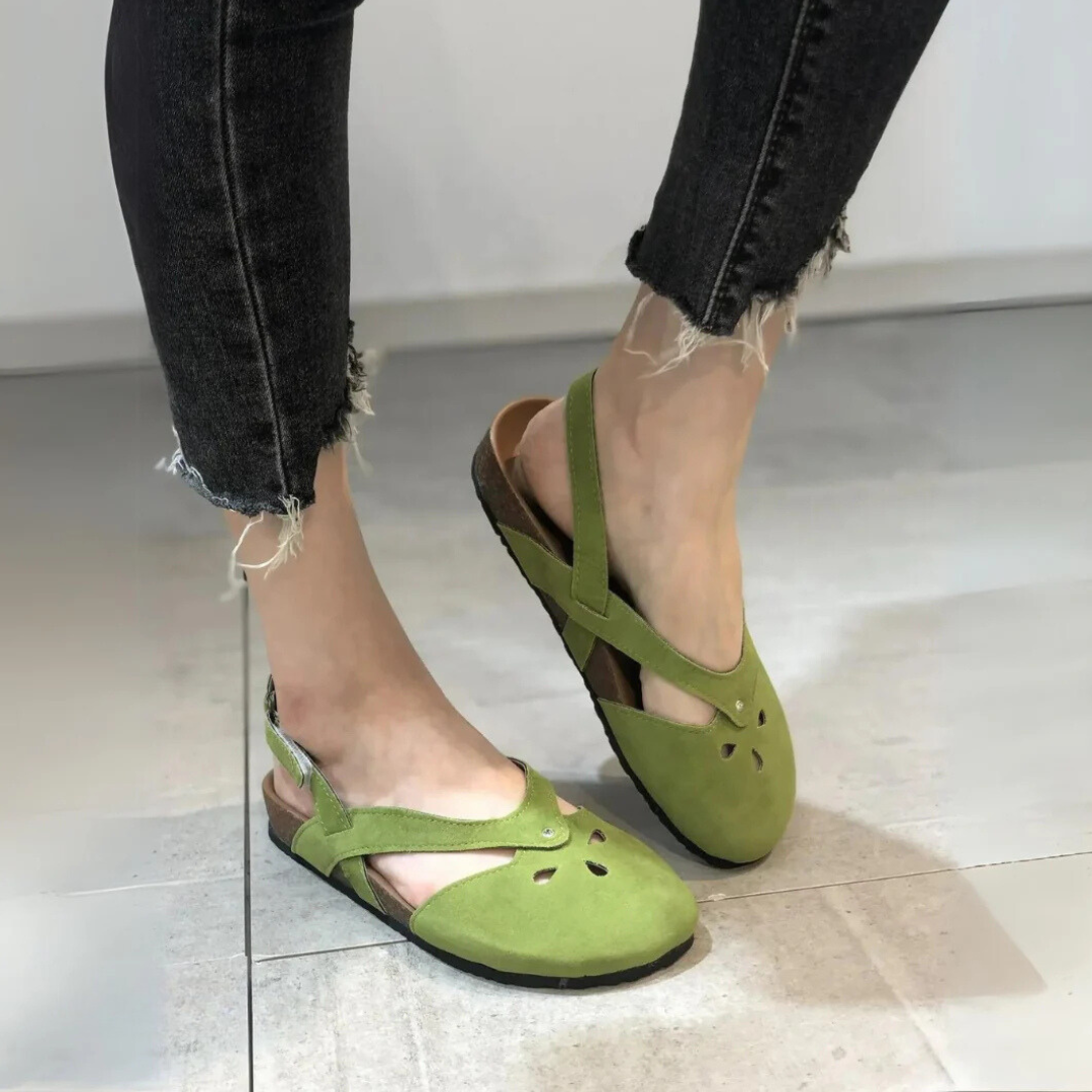 Women's orthopedic slingback sandals with ergonomic insole, cross-strap, and closed toe for style and comfort.