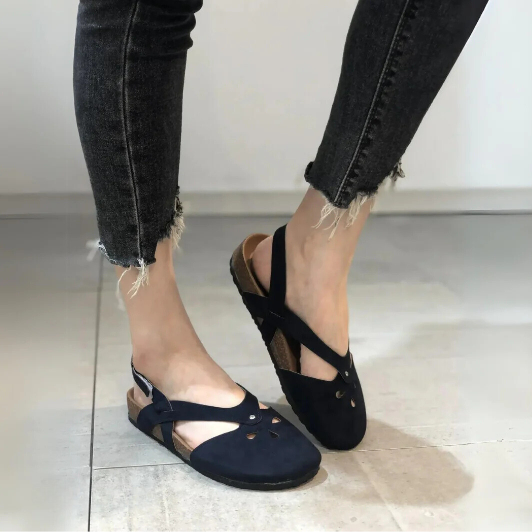 Women's orthopedic slingback sandals with ergonomic insole, cross-strap, and closed toe for style and comfort.
