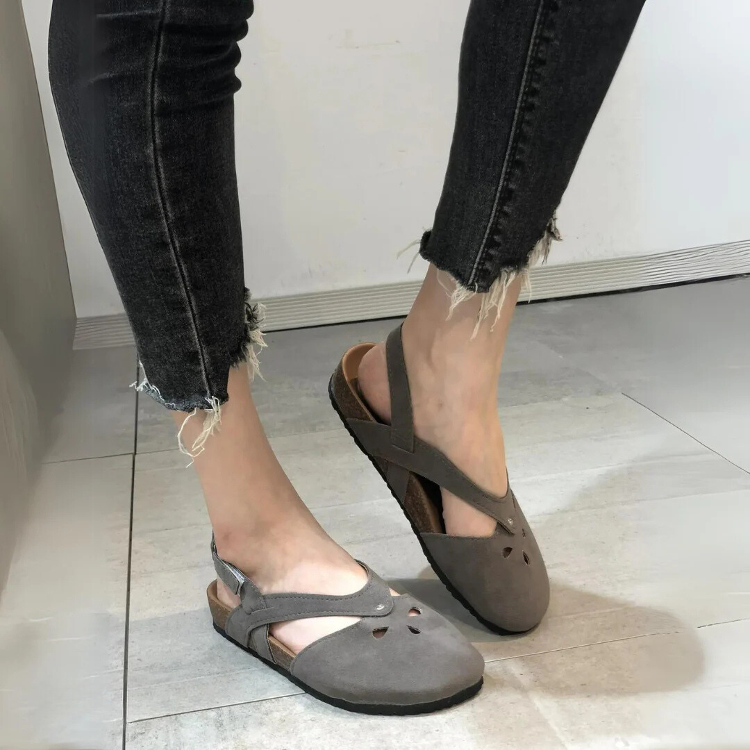 Women's orthopedic slingback sandals with ergonomic insole, cross-strap, and closed toe for style and comfort.