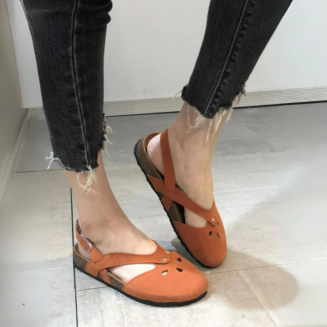 Women's orthopedic slingback sandals with ergonomic insole, cross-strap, and closed toe for style and comfort.