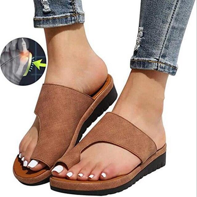 Women's orthopedic slip-on sandals with toe-support, brown color, featuring cushioned soles and toe-alignment design.