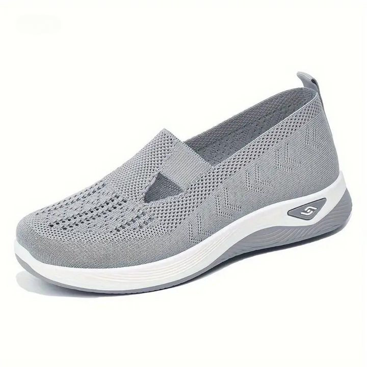 Women's orthopedic slip-on shoes with arch support, featuring a sleek, breathable design for ultimate comfort and style.