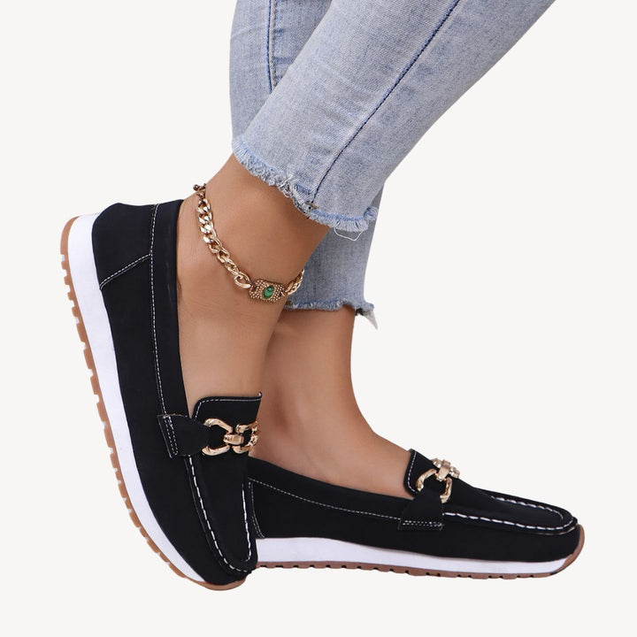 "Women's orthopedic suede loafers with gold chain detail, soft suede, and slip-on design for style and comfort."