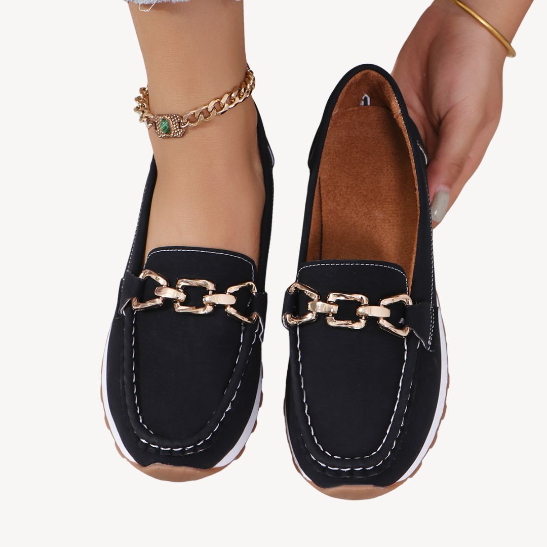 "Women's orthopedic suede loafers with gold chain detail, soft suede, and slip-on design for style and comfort."