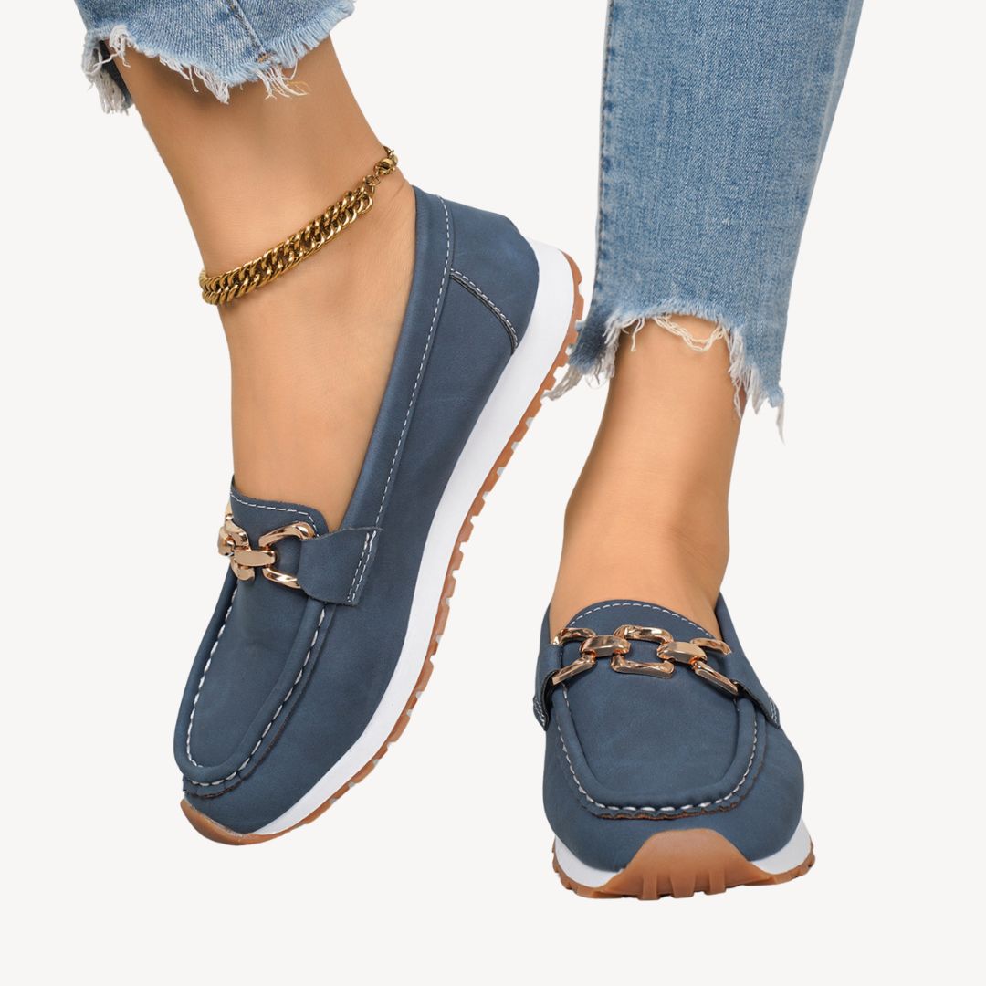 "Women's orthopedic suede loafers with gold chain detail, soft suede, and slip-on design for style and comfort."