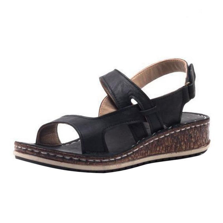 "Women's orthopedic summer sandals with adjustable straps, open-toe design, ergonomic footbed, and slip-resistant sole."
