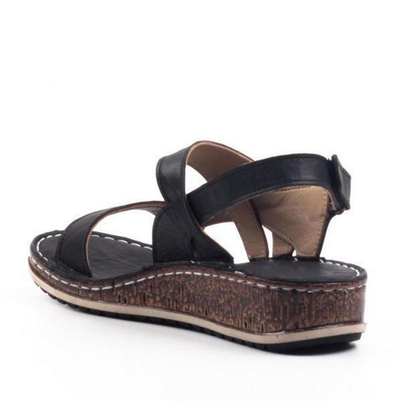 "Women's orthopedic summer sandals with adjustable straps, open-toe design, ergonomic footbed, and slip-resistant sole."