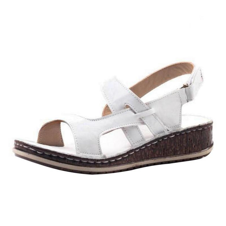 "Women's orthopedic summer sandals with adjustable straps, open-toe design, ergonomic footbed, and slip-resistant sole."