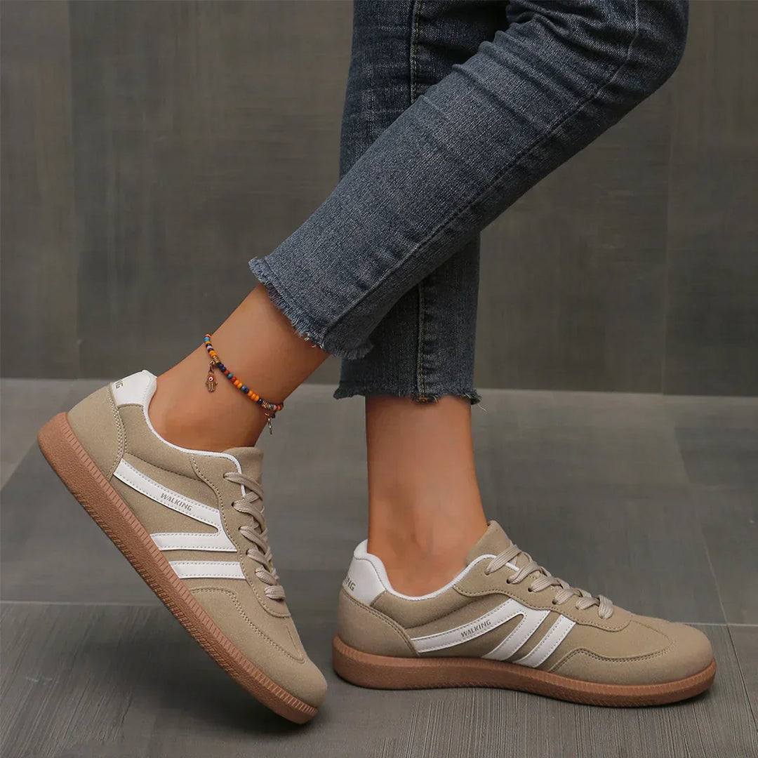 "Women's orthopedic walking sneakers with arch support, lightweight, breathable, casual design for comfort and style."