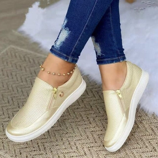 Women's orthopedic zip-up shoes, supportive design, black, gold, white, casual footwear for all-day comfort and stability.