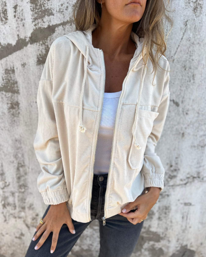 "Women's retro corduroy zip jacket with hood, showcasing vintage style with its textured fabric and practical zip closure."