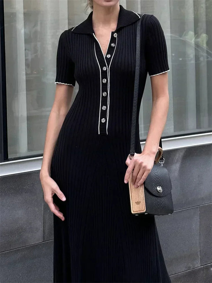 "Women's ribbed knit maxi dress with collared V-neck, button details, and flowing silhouette in versatile colors."