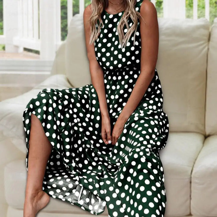 "Women's sleeveless polka dot maxi dress, vintage vibe, flowing fit, sleeveless for comfort, perfect for casual outings."