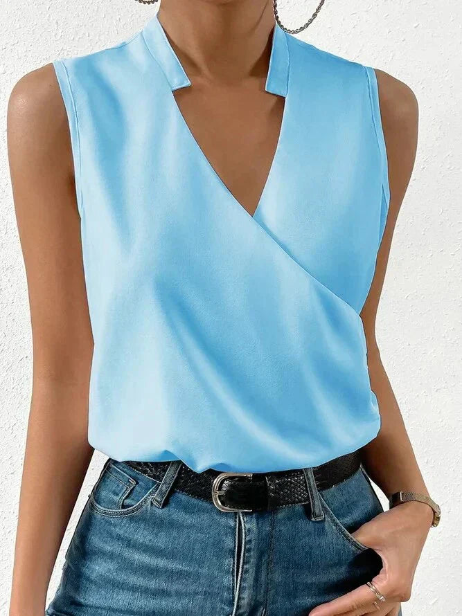 "Women's sleeveless summer blouse, white, chic and versatile design, perfect for casual or dressy occasions, breathable fabri
