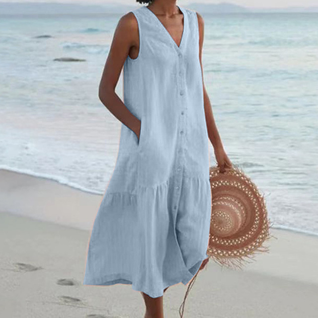 "Women's sleeveless V-neck summer dress with pockets, front view, ideal for casual outings and beach days."