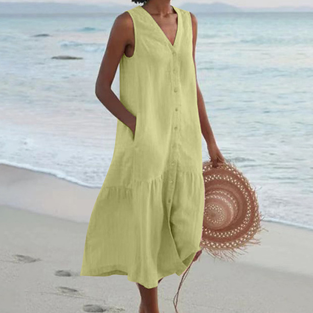 "Women's sleeveless V-neck summer dress with pockets, front view, ideal for casual outings and beach days."