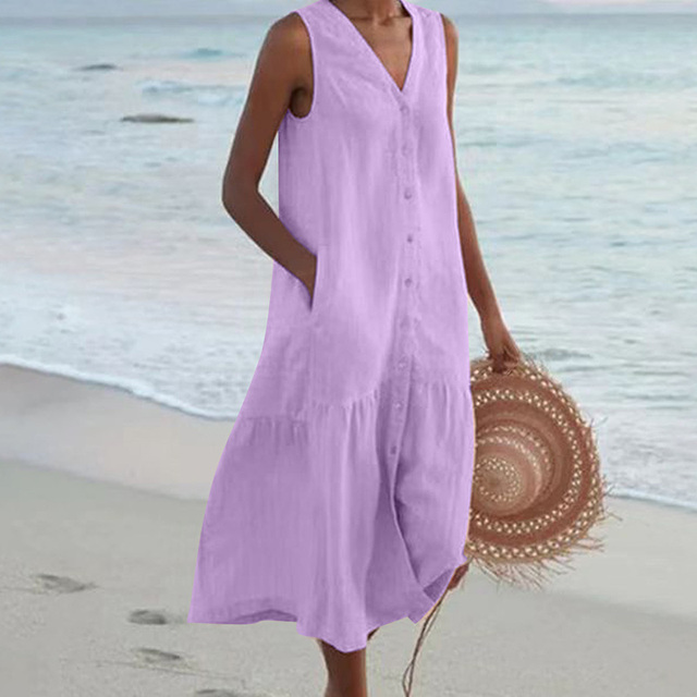 "Women's sleeveless V-neck summer dress with pockets, front view, ideal for casual outings and beach days."