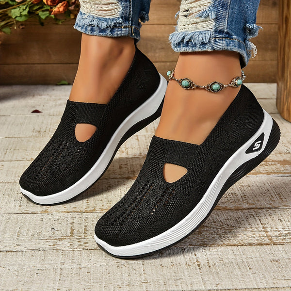 "Women's slip-on sneakers modern silhouette, comfortable fit, sleek design, ideal for everyday wear"
