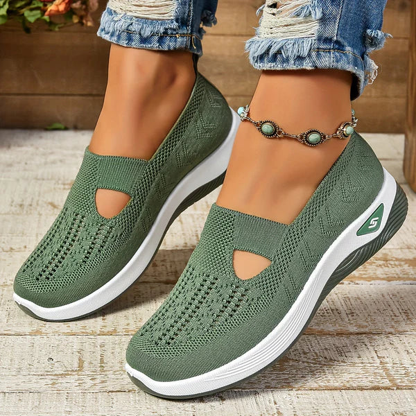 "Women's slip-on sneakers modern silhouette, comfortable fit, sleek design, ideal for everyday wear"
