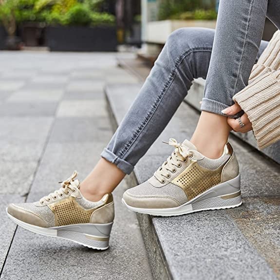 "Women's sneakers with hidden wedge heel, breathable mesh design, lace-up, in various colors, chic and comfortable."