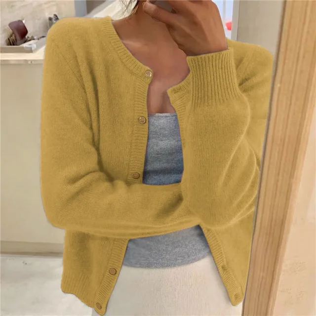 Women's solid color knit cardigan, soft breathable fabric, stylish minimalist design, versatile wardrobe essential.