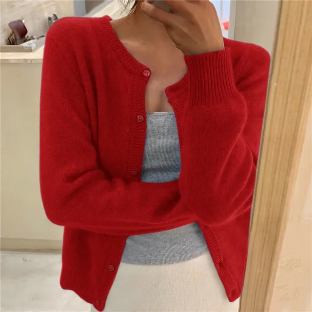Women's solid color knit cardigan, soft breathable fabric, stylish minimalist design, versatile wardrobe essential.