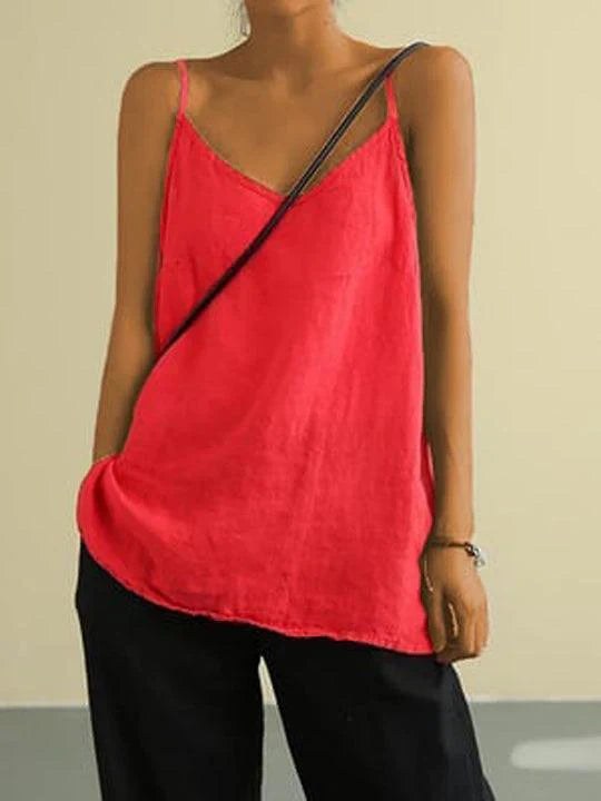 "Women's spaghetti strap summer linen top, lightweight, flowy fit, perfect for warm days, showcases effortless style."