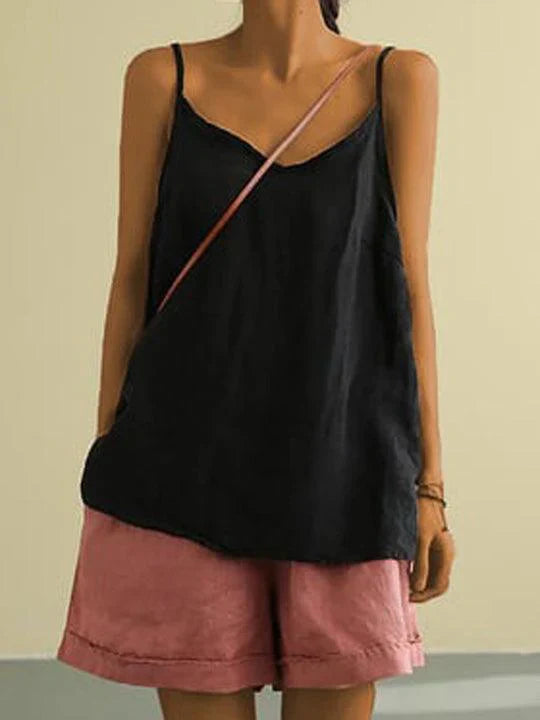 "Women's spaghetti strap summer linen top, lightweight, flowy fit, perfect for warm days, showcases effortless style."