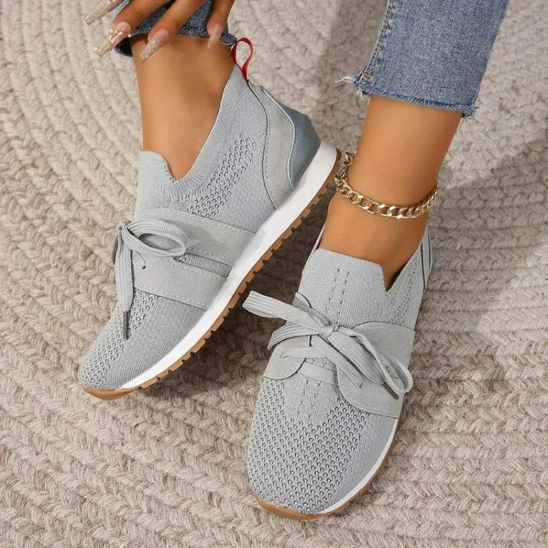 Women's sporty sneakers with breathable mesh, sleek design, non-slip sole, available in multiple colors and sizes 35-42.