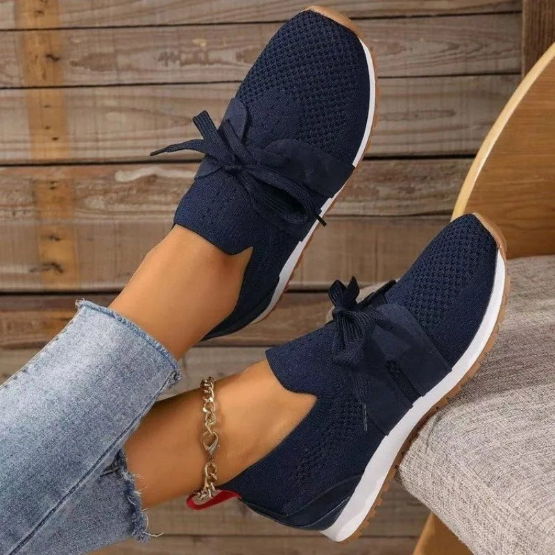 Women's sporty sneakers with breathable mesh, sleek design, non-slip sole, available in multiple colors and sizes 35-42.