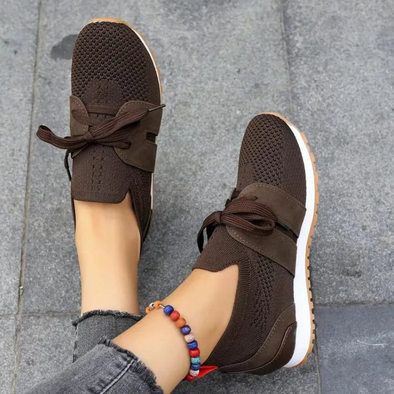 Women's sporty sneakers with breathable mesh, sleek design, non-slip sole, available in multiple colors and sizes 35-42.