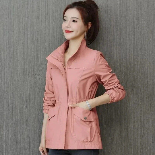 Women's spring trench coat, khaki, mid-length, with adjustable waist and button-down closure, perfect for breezy days.