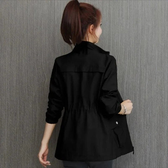 Women's spring trench coat, khaki, mid-length, with adjustable waist and button-down closure, perfect for breezy days.