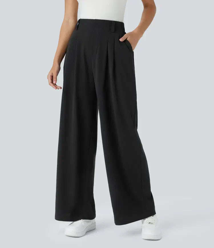 Women's stretch trousers, black, smooth fabric, tailored fit, flexible style, ideal for casual to formal outfits.