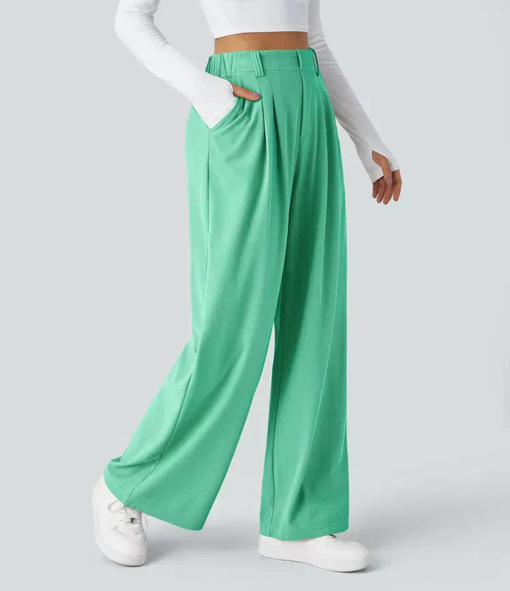 Women's stretch trousers, black, smooth fabric, tailored fit, flexible style, ideal for casual to formal outfits.