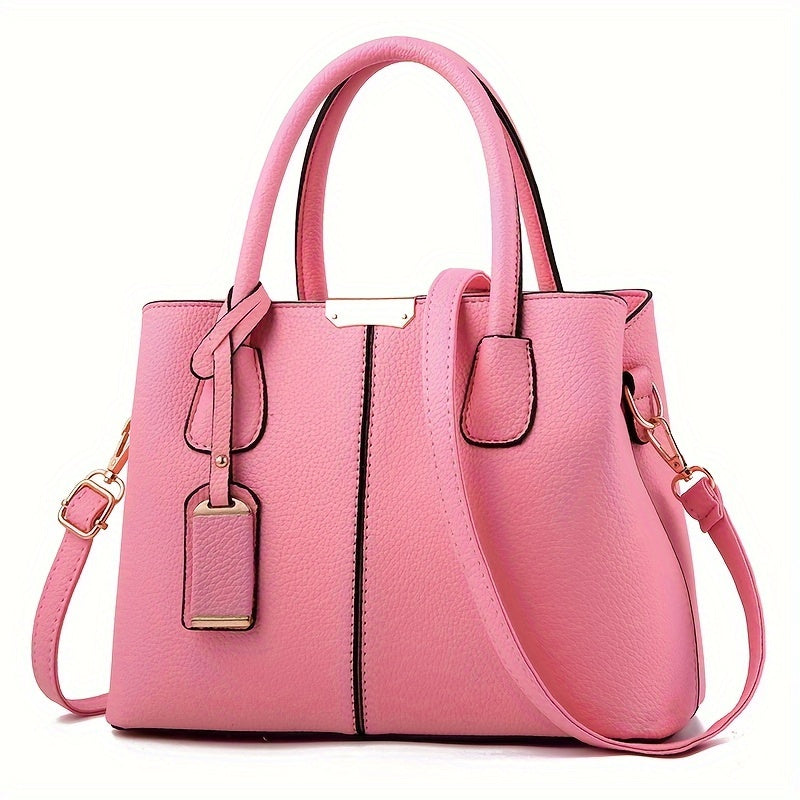 Women's stylish leather handbag with tote design, detachable crossbody strap, gold accents, spacious interior, elegant look.
