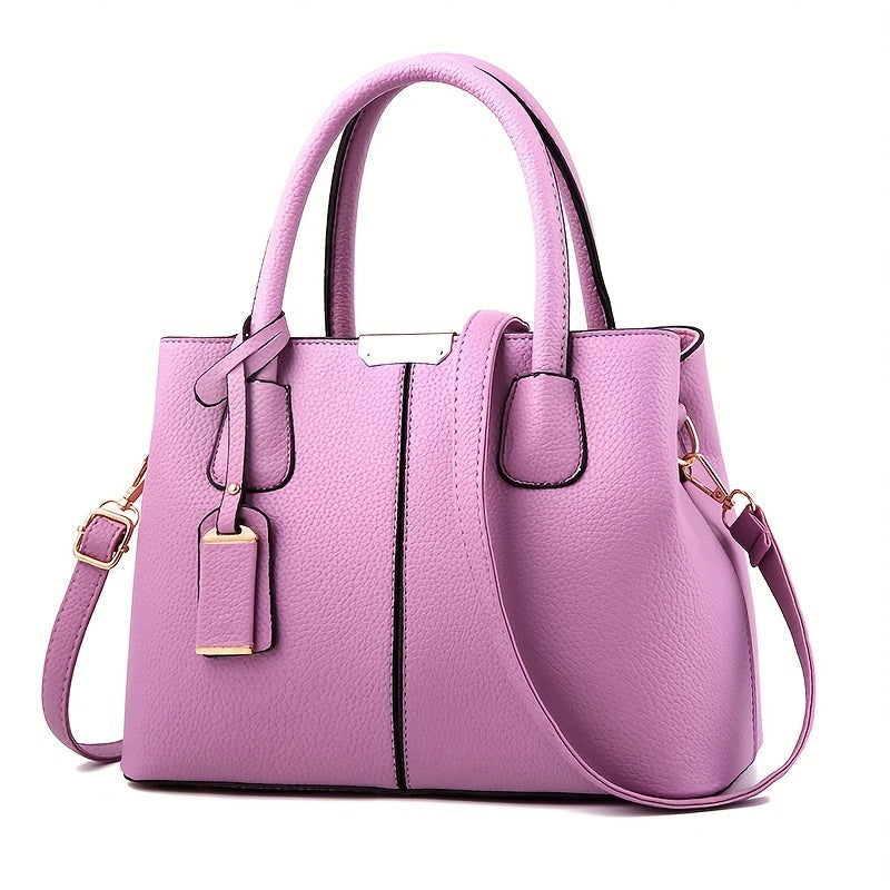 Women's stylish leather handbag with tote design, detachable crossbody strap, gold accents, spacious interior, elegant look.