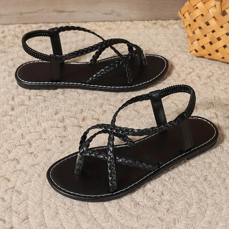 "Women's stylish slip-on sandals with ergonomic footbed, minimalist design, adjustable straps, and durable materials."