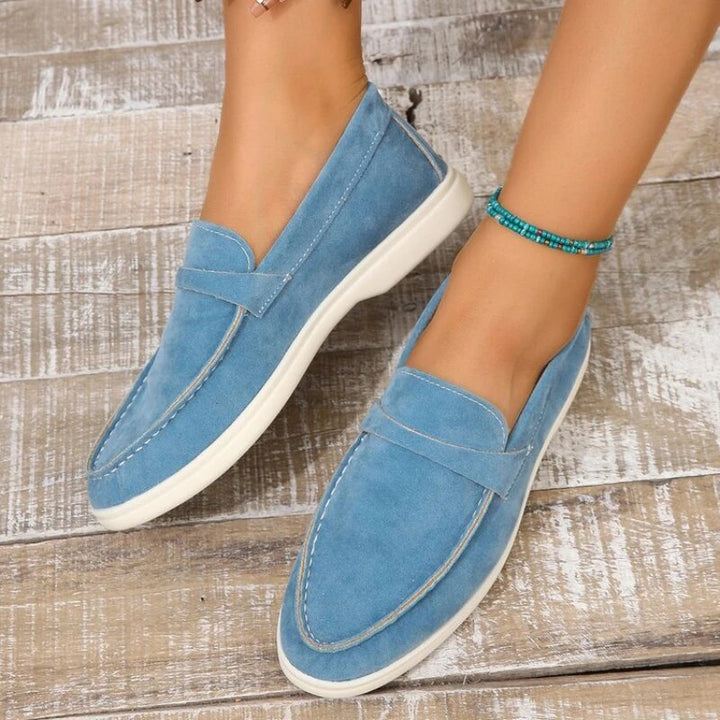 Women's suede slip-on loafers, classic design, sleek silhouette, perfect for casual and office wear, in soft suede.