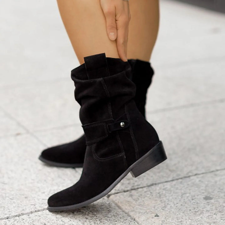 "Women's suede slouchy ankle boots with low heel, beige, side view, chic and comfortable, perfect for any outfit."
